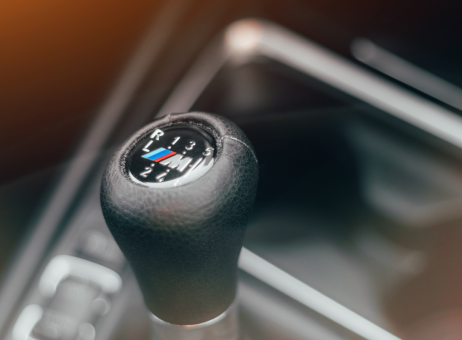 Image of car interior close up on the gear stick